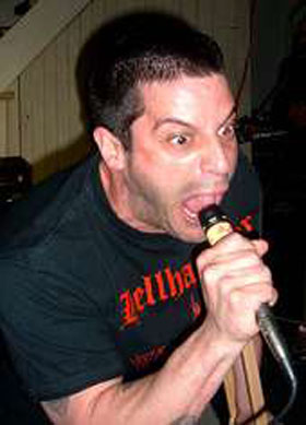 Paul singing with The Inmates