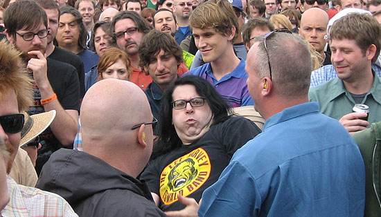 TimeBomb Tom being escorted from Touch & Go Anniversary fest...also note Jae from Deathers/Self-Destruct Button behind dude with glasses...and that looks like one of The Lamps on the far right...